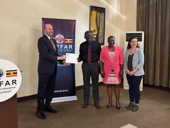 Empowering Hope: Karin Receives PEPFAR Grant Certificate at American Embassy Ceremony